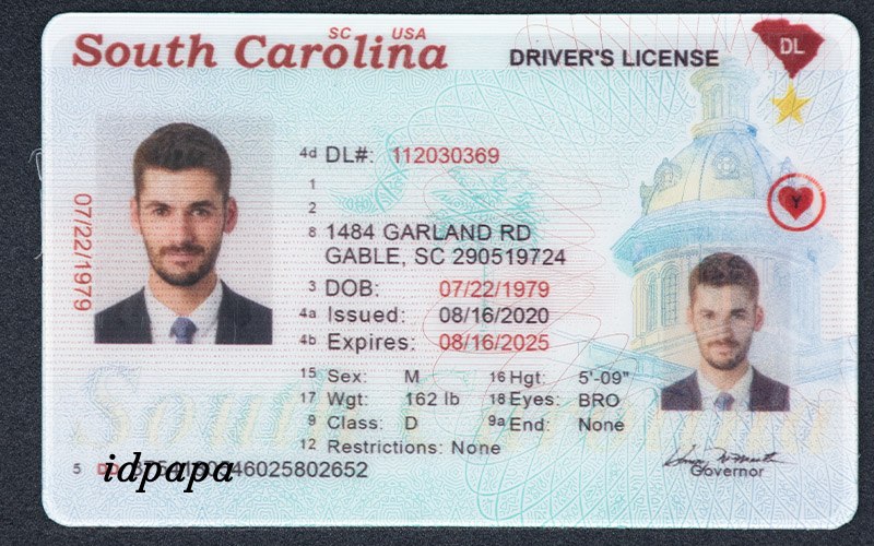 A novelty South Carolina driver’s license with the name IDPAPA, featuring a male photo, custom details, and a red heart symbol