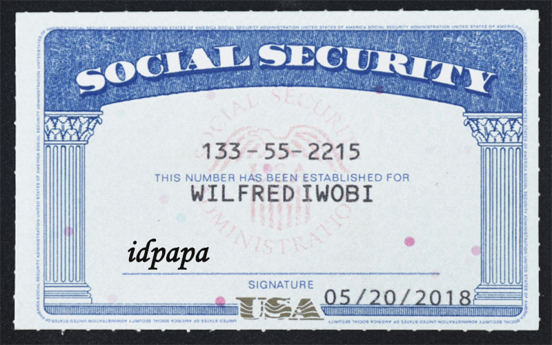 Novelty Social Security card labeled for Wilfred Iwobi with the number 133-55-2215, signature dated 05/20/2018, and the word idpapa printed in black font